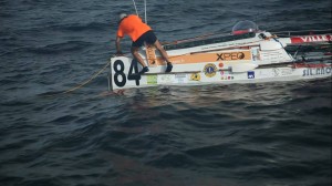 Rémy à l'arrière de son bateau